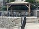 An outdoor seating area with picnic table and chairs at 3817 Paces Ferry West, Atlanta, GA 30339