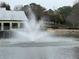 Scenic view of a pond with a water fountain feature at 3817 Paces Ferry West, Atlanta, GA 30339