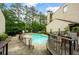 Beautiful community pool surrounded by lush trees and landscaping at 3817 Paces Ferry West, Atlanta, GA 30339