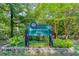 City of Atlanta, Beaverbrook Park sign showing lush greenery and a peaceful park setting at 1039 Northcliffe Nw Dr, Atlanta, GA 30318