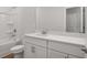 Clean bathroom with a white vanity, countertop, and a shower-tub combination at 1723 Juniper Berry Way, Loganville, GA 30052