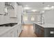 Modern kitchen featuring stainless steel appliances, a large island, and ample counter space at 1723 Juniper Berry Way, Loganville, GA 30052