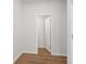 Small room featuring neutral walls, wood floors and white trim at 1723 Juniper Berry Way, Loganville, GA 30052