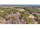 Wide aerial shot of the acreage, displaying the vast property and the home's secluded location at 2999 Happy Hollow Dr, Conyers, GA 30094