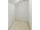 Finished attic storage space with neutral carpeting and clean white walls at 2999 Happy Hollow Dr, Conyers, GA 30094