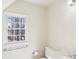 Bright bathroom with a window and a vanity counter at 2999 Happy Hollow Dr, Conyers, GA 30094