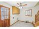 Functional mud room with a tiled floor, utility sink and a convenient door to the outside at 2999 Happy Hollow Dr, Conyers, GA 30094