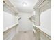 Spacious walk-in closet featuring ample shelving and hanging space at 2999 Happy Hollow Dr, Conyers, GA 30094