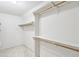 A functional walk-in closet offers ample shelving and storage solutions at 2999 Happy Hollow Dr, Conyers, GA 30094
