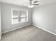 Bedroom with a ceiling fan and a window letting in natural light at 3194 Haynes Park Dr, Lithonia, GA 30038