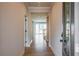 Open entryway showcasing hardwood floors and views of the bright, open living space at 718 Crossroad Ct, Powder Springs, GA 30127