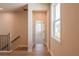 Hallway showing access to rooms and a view of the exterior through a window at 718 Crossroad Ct, Powder Springs, GA 30127