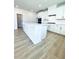 Modern kitchen featuring a large center island, stainless appliances, and plenty of counter space at 718 Crossroad Ct, Powder Springs, GA 30127