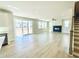 Spacious living room features modern fireplace and large sliding glass doors with abundant natural light at 718 Crossroad Ct, Powder Springs, GA 30127