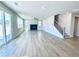 Spacious living room with lots of natural light and wood flooring at 718 Crossroad Ct, Powder Springs, GA 30127