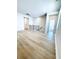 Loft area with durable flooring offers flexible living space near upstairs bedrooms at 718 Crossroad Ct, Powder Springs, GA 30127
