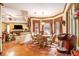 Cozy dining area featuring a round table, wooden chairs, and ample natural light at 1824 Colonial South Sw Dr, Conyers, GA 30094