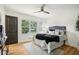 This bedroom has a ceiling fan, and windows that let in natural light at 2210 Bolling Brook Sw Dr, Atlanta, GA 30311