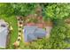 Aerial view of the home with a private backyard, wooden deck, and lush greenery at 274 Westchester Club Dr, Hiram, GA 30141