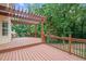 Spacious wooden deck with pergola overlooking the backyard at 274 Westchester Club Dr, Hiram, GA 30141