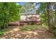 Spacious backyard with a wooden deck and lush green surroundings at 274 Westchester Club Dr, Hiram, GA 30141