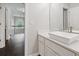 Upstairs bathroom with new vanity and wood floors at 274 Westchester Club Dr, Hiram, GA 30141