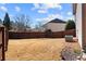 Expansive backyard with a well-maintained lawn and privacy fence, offering plenty of space for outdoor activities at 3830 Deer Run Dr, Cumming, GA 30028