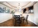 Dining room features hard wood floors, natural light and stylish decor at 1165 Pin Oak Ct, Cumming, GA 30041