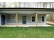 Covered porch features ceiling fans and great views of the backyard and landscaping at 2117 Hwy 101 N, Dallas, GA 30157