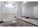 Bright bathroom featuring subway tile surround, granite counters, and modern fixtures at 2117 Hwy 101 N, Dallas, GA 30157