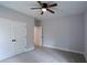 Bright bedroom with double doors to the closet and views to the hallway at 2117 Hwy 101 N, Dallas, GA 30157
