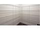 Spacious walk-in closet offering ample storage and well-organized shelving system at 2117 Hwy 101 N, Dallas, GA 30157