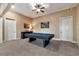 Basement game room with billiard table and space for recreation at 3330 Chimney Point Dr, Cumming, GA 30041