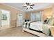 Spacious bedroom with a comfortable bed, dresser, and ample natural light at 3330 Chimney Point Dr, Cumming, GA 30041