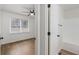 Hallway view to bedroom and bathroom with hardwood floors and white paint at 365 Cowan Rd, Covington, GA 30016