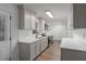 Bright kitchen featuring subway tile backsplash, stainless steel appliances, and modern fixtures at 365 Cowan Rd, Covington, GA 30016