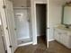 Bathroom featuring a stand up shower with a white tile surround at 430 Citronelle Dr, Woodstock, GA 30188