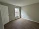 Cozy bedroom featuring a window for natural light at 430 Citronelle Dr, Woodstock, GA 30188