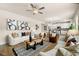 Inviting living room seamlessly connects to a modern kitchen, creating a harmonious open-concept space at 125 Maplewood Ln, Conyers, GA 30094
