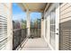 Private balcony with black railings offers a relaxing outdoor space at 2300 Peachford Rd # 3411, Atlanta, GA 30338