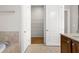 Bathroom featuring soaking tub and access to walk-in closet at 2300 Peachford Rd # 3411, Atlanta, GA 30338