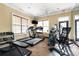 Well-equipped gym featuring treadmills, elliptical machines, free weights, and wall-mounted tv at 2300 Peachford Rd # 3411, Atlanta, GA 30338