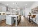Bright kitchen featuring an island with seating, stainless steel appliances, and modern pendant lighting at 2320 Edgar Park Pl # 95, Duluth, GA 30096