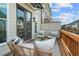 Charming outdoor patio featuring comfortable seating, a wooden deck, and a cozy ambiance at 2320 Edgar Park Pl # 95, Duluth, GA 30096