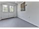 Basement features double doors leading to outside at 283 Harmony Lake Dr, Canton, GA 30115