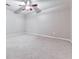 Neutral bedroom featuring a ceiling fan, neutral paint, and carpeted floors at 283 Harmony Lake Dr, Canton, GA 30115