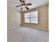 Bright bedroom with a ceiling fan, offering a serene retreat after a long day at 283 Harmony Lake Dr, Canton, GA 30115