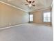 Bedroom featuring neutral carpeting and natural light from two windows at 283 Harmony Lake Dr, Canton, GA 30115