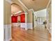 Spacious dining room featuring hardwood floors, decorative molding, and a modern light fixture at 283 Harmony Lake Dr, Canton, GA 30115