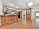 Spacious kitchen with wood cabinets, appliances, and laminate flooring at 283 Harmony Lake Dr, Canton, GA 30115